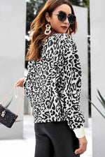 Load image into Gallery viewer, Leopard Round Neck Loose Sweater
