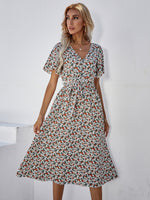 Load image into Gallery viewer, Floral Print Allover Bell Sleeve Belted Midi Dress
